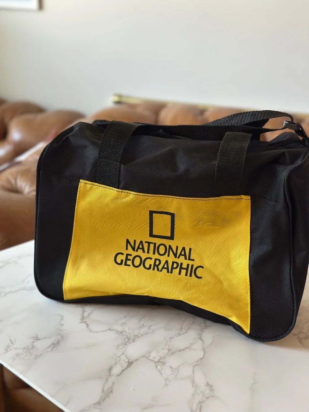 National Geographic · Mini Duffle Bag (yellow/black) 13.75